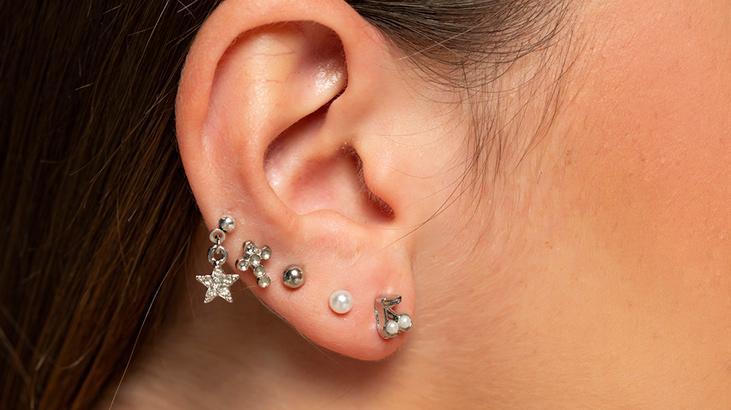 enfeksiyon ve isitme kaybi riski coklu piercing tehlikesi kulak memesini bile yirtiyor NZvNDgjU.jpg